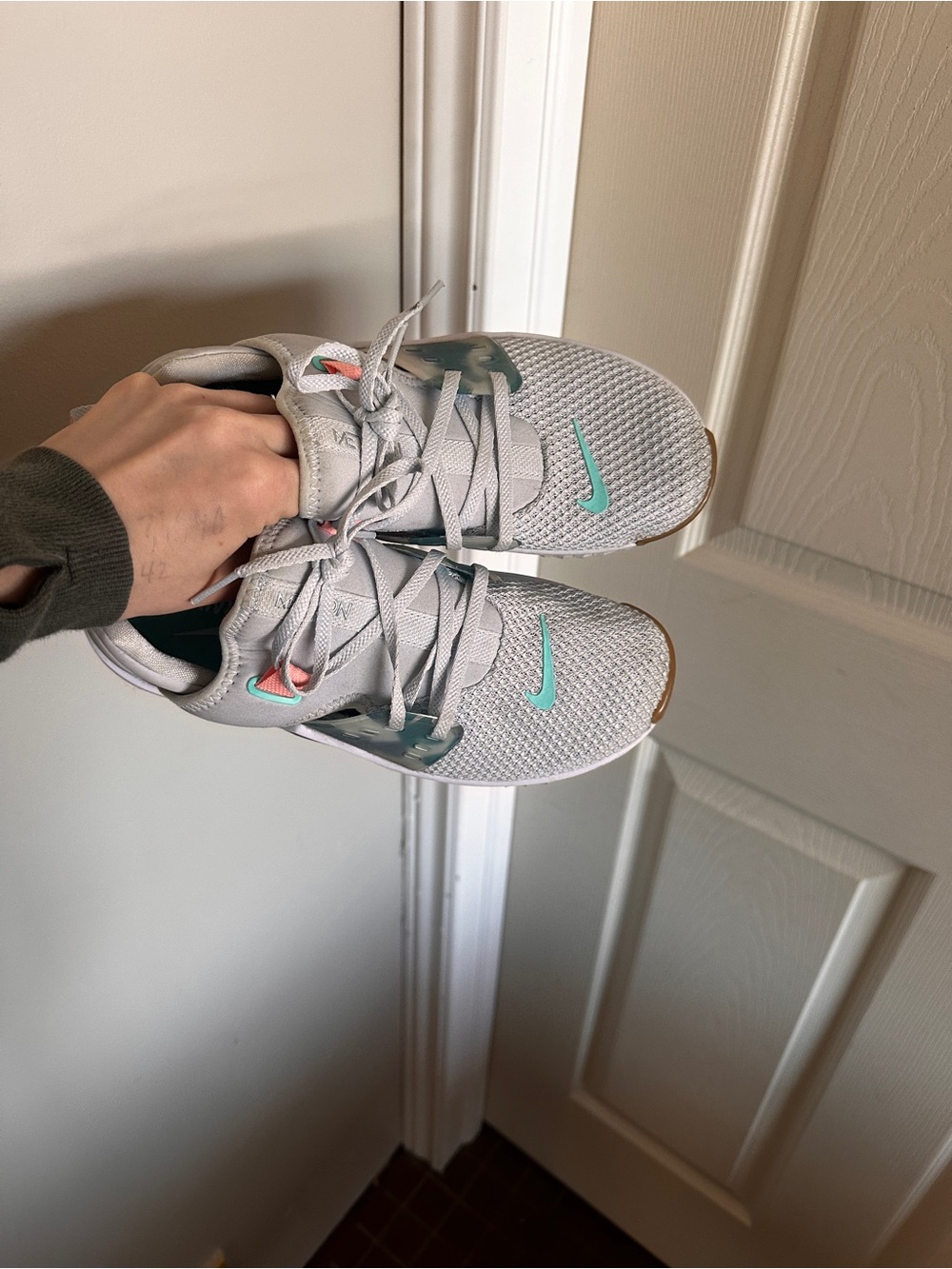 Nike Light Gray Trainers with Teal Accents
